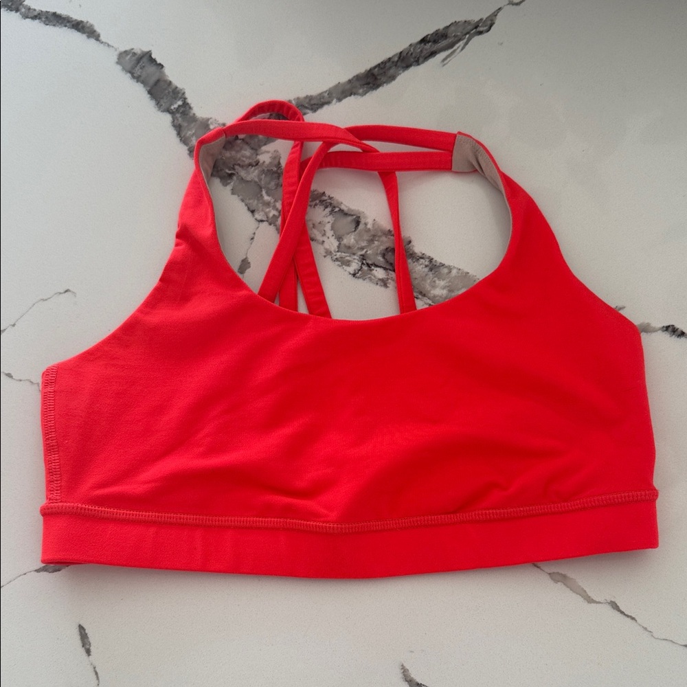 Lululemon Athletica bright orange Sports Bra